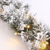 Schneebedeckte künstliche Weihnachtsgirlande 'Dinsmore' weiβ
